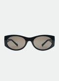 Otra Eyewear - GRACE - Black/Smoke - Front view of GRACE sunglasses in Black/Smoke featuring a glossy black oval frame, smoke-tinted lenses, and a softly curved silhouette, displayed against a clean light grey background. A timeless everyday style designed for versatile wear with full UV400 protection.