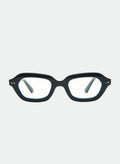 Otra Eyewear - DERBY Blue Light - Front view of DERBY Blue Light glasses featuring a glossy black cat-eye frame with blue light filtering clear lenses, displayed against a clean light grey background. A sleek small-frame design that combines timeless style with everyday screen protection.