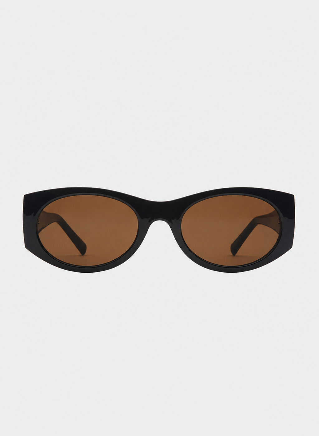 Otra Eyewear - GRACE - Dark Chocolate/Brown - Front view of GRACE sunglasses in Dark Chocolate/Brown featuring a glossy dark chocolate oval frame, warm brown lenses, and a softly curved silhouette, displayed against a clean light grey background. A timeless everyday style designed for versatile wear with full UV400 protection.