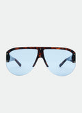 Otra Eyewear - Vista - Tort/ Blue - Front view of shield sunglasses in Tort/Blue featuring an oversized rimless light blue shield lens, bold tortoiseshell brow bar, and signature gold stud detailing. 