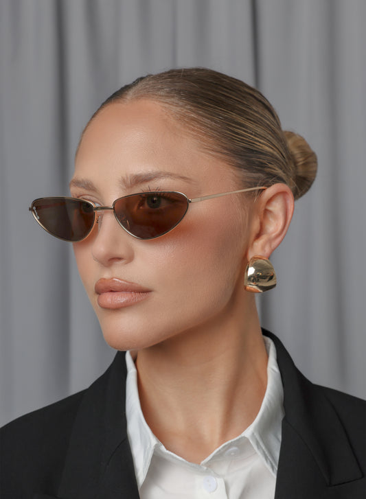Aster gold sunglasses on-model