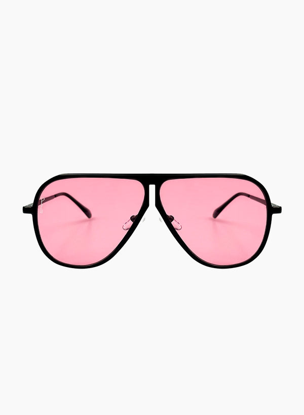 Otra Eyewear - Ava Black/Pink - Front view of Ava sunglasses featuring a classic aviator silhouette reinterpreted with a bold black metal frame and vibrant pink lenses, displayed against a clean light grey background. A lightweight yet impactful design created to make a confident, modern statement.