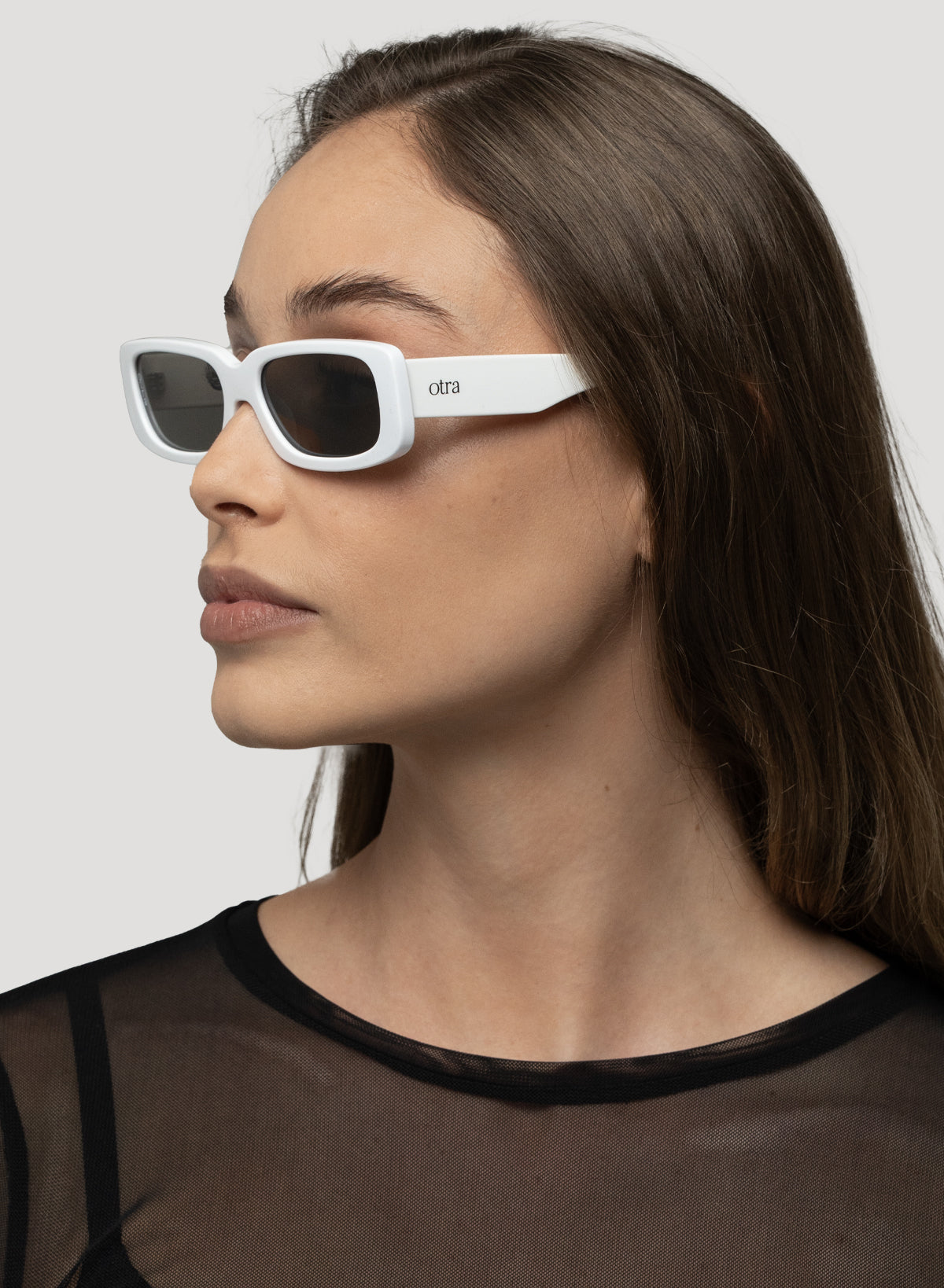 Model side view of Sunny white small sunglasses 