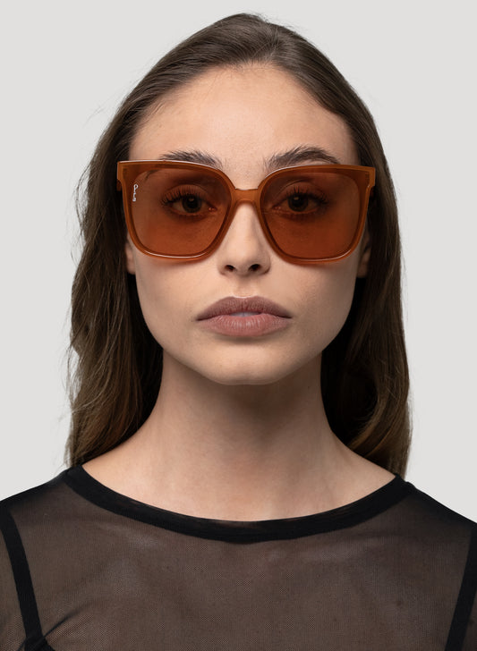 Model wearing Sweet About Me oversized sunglasses in brown