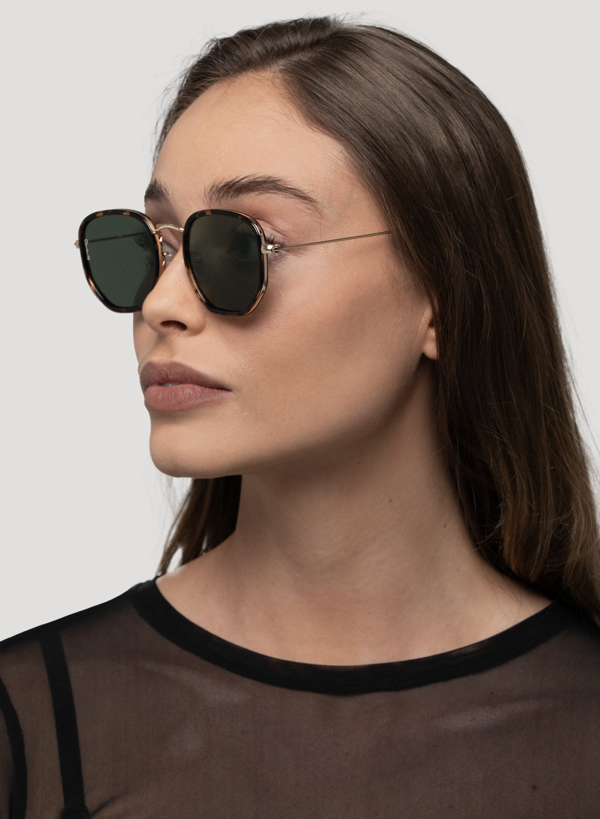 Side view of model wearing Tate glasses in tortoiseshell