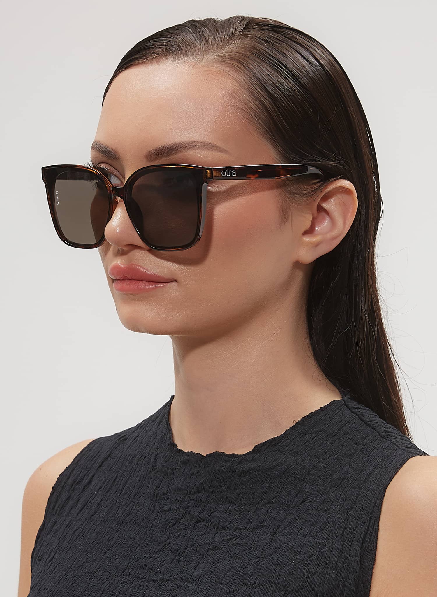 Model side view of Oversized square Betty sunglasses